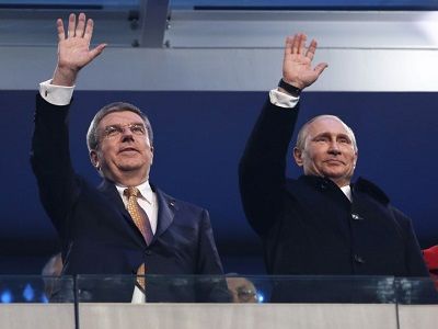Президент МОК Томас Бах и Владимир Путин в Сочи, 2014 г. Фото: svoboda.org